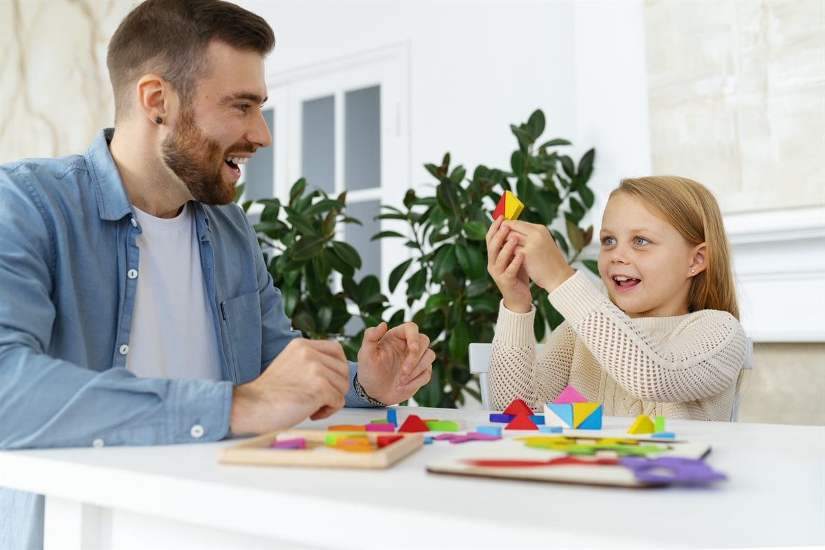 A father spending time with his kid at home